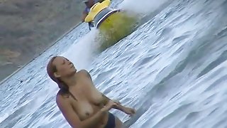 Spycam on beach records amateurs topless and also nude